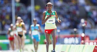 Ethiopia's Diro finishes 7th after losing shoe, gets final entry