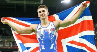Whitlock bags historic gymnastics golds; Biles shines again