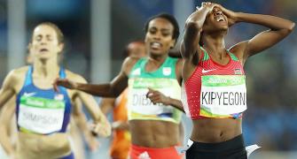 Kenyan Kipyegon shocks Dibaba to win 1,500m gold