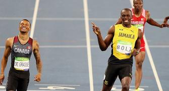 Not so fast young man, Bolt cautions De Grasse