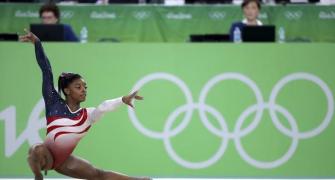 Simone Biles of USA wins all-around gymnastics gold