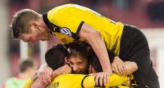 Dortmund reach 13th Cup semis amid ticket protest by Stuttgart fans