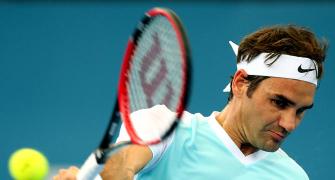 PHOTOS: Champion Federer sets up Raonic final in Brisbane
