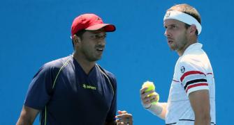 Bhupathi enters second round but Paes knocked out in doubles