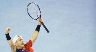 Hewitt prolongs Australian Open swansong as family watches from stands