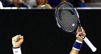 Djokovic quells Federer fightback to enter Aus Open final