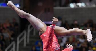 Future uncertain but incredible Biles won't give up
