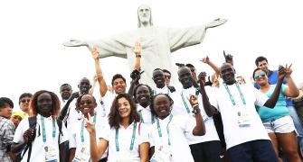 First-ever refugee team ascends to Rio's Christ statue