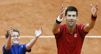 Djokovic, Serena face overtime in Paris