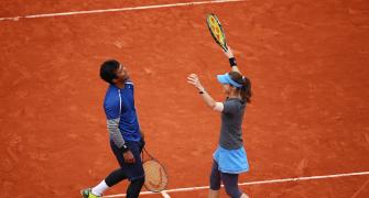 Paes-Hingis rally to win their first French Open mixed doubles title