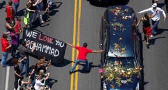 Thousands of mourners gather to bid Muhammad Ali a final goodbye