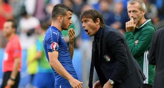 Flamboyant Conte roars out of garage and burns up grass