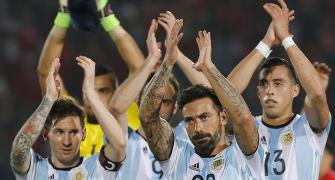 Argentina fight back for 2-1 win on Messi return