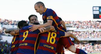 PHOTOS: Suarez 'tricks' Barcelona to La Liga title