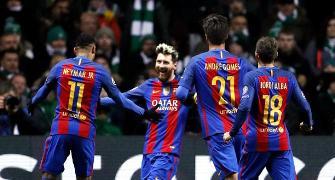 PHOTOS: Messi double lifts Barcelona, Man City advance