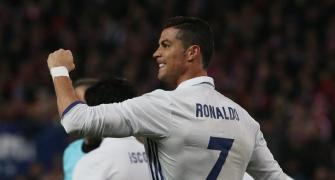La Liga: Ronaldo treble sinks Atletico, Barcelona held