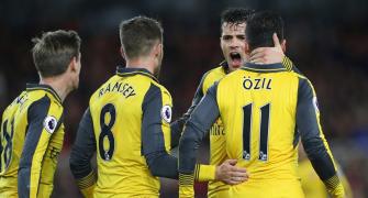 Arsenal keep Champions League hopes alive with Boro win
