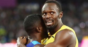 PHOTOS: Bogeyman Gatlin booed as Bolt's saintliness shines