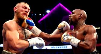 PHOTOS: Ruthless Mayweather silences McGregor to register 50th win