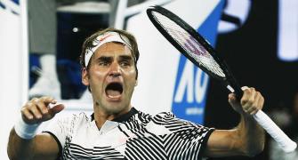 PHOTOS: Resilient Federer holds off Nishikori to reach quarter-finals
