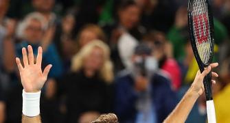 Australian Open: Roger Federer fights off Wawrinka to reach final
