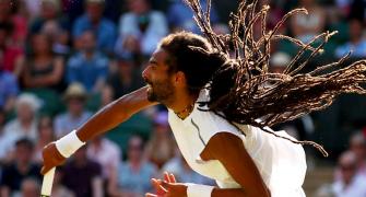 No handshakes, no fans as live tennis resumes