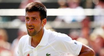 Djokovic means business as he reaches fourth round