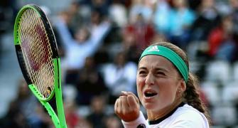 Ostapenko outclasses Wozniacki to reach French semis