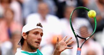 Tennis round-up: Defending champ Pouille out of Hungarian Open