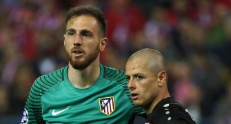 Atletico march into quarters as Oblak shines