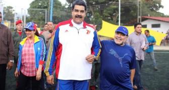 Maradona cozies up to controversial Venezuelan President