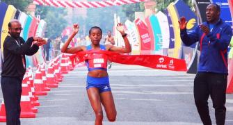 Ethopians brave smog to clinch Delhi Half Marathon races