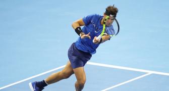 China Open: Nadal survives Pouille fright to advance