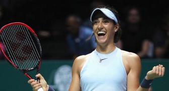 WTA Finals: Garcia stuns Wozniacki to advance, Halep out