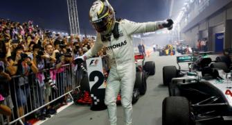 Singapore GP: Hamilton wins after Vettel crashes out