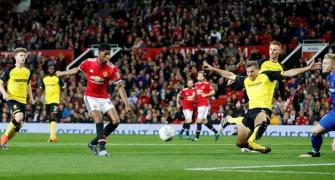 Rashford double helps Manchester United sink Burton