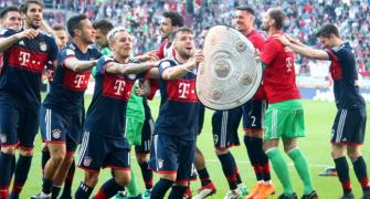 Football Briefs: Bayern overcome bizarre own goal to clinch another title