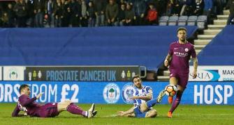 PICS: Ten-man Manchester City sunk by third-tier Wigan in FA Cup