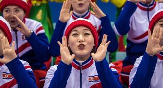 Kim's cheer squad 'charm offensive'