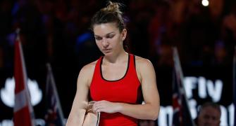 No escapes for brave Halep in third Grand Slam final