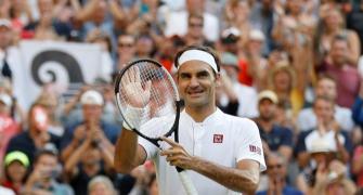 Wimbledon PHOTOS: Federer marches on; Venus, Keys crash out
