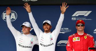 F1: Hamilton beats the elements to seize pole in wet Hungary
