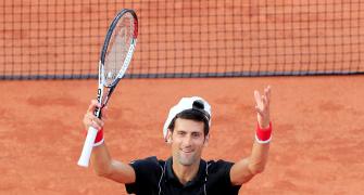 French Open PIX: Djokovic eases into quarters
