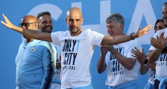 Man City coach Guardiola extends contract to 2021