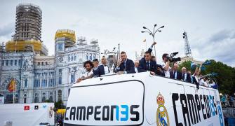 PHOTOS: Champions Real Madrid paint the town white during parade
