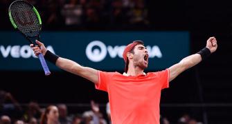 PHOTOS: Khachanov stuns Djokovic to win Paris Masters