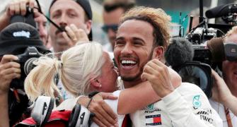 Mature Hamilton humbled by winning a fifth F1 title