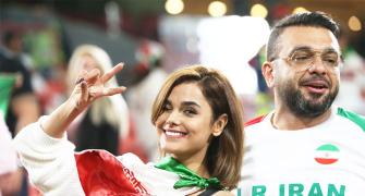 PHOTOS: Fans turn up the buzz at Asian Cup football!