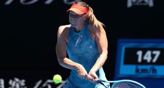 Sharapova sets up mouth-watering Wozniacki clash