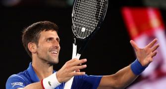 Aus Open: Djokovic destroys Pouille to set up Nadal showdown